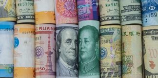 US dollar and China Yuan banknote with multi countries banknotes. Its is symbol for tariff trade war crisis or unfair business of 2 biggest economic countries in the world.